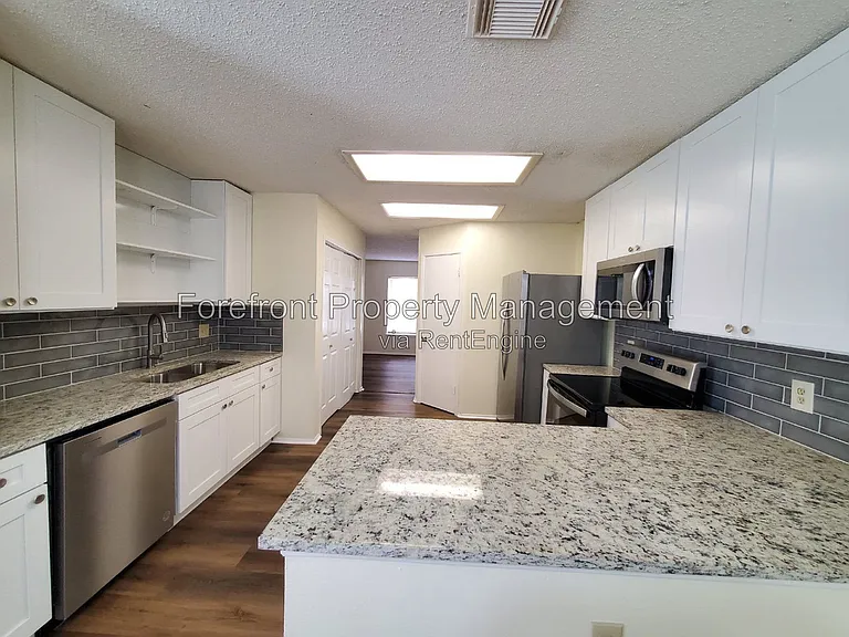8219 Sunshine Trail Dr — Photo 13