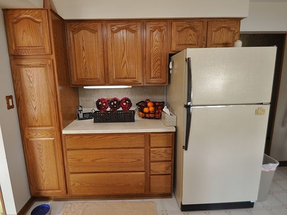4th image of 9045 S Natoma Ave