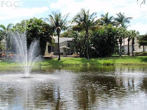 Across the lake looking at the back of home