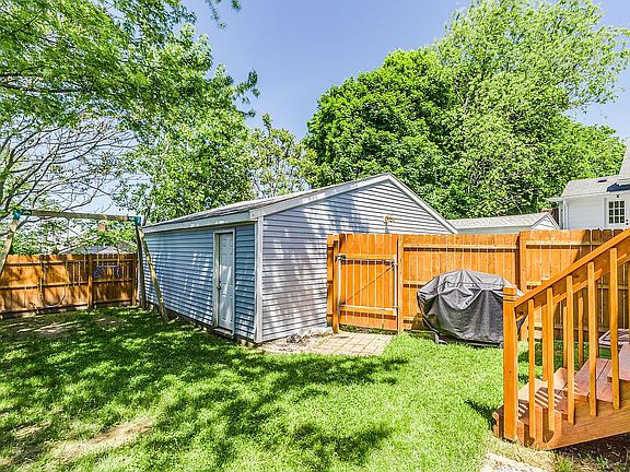 Wood fence-in backyard.