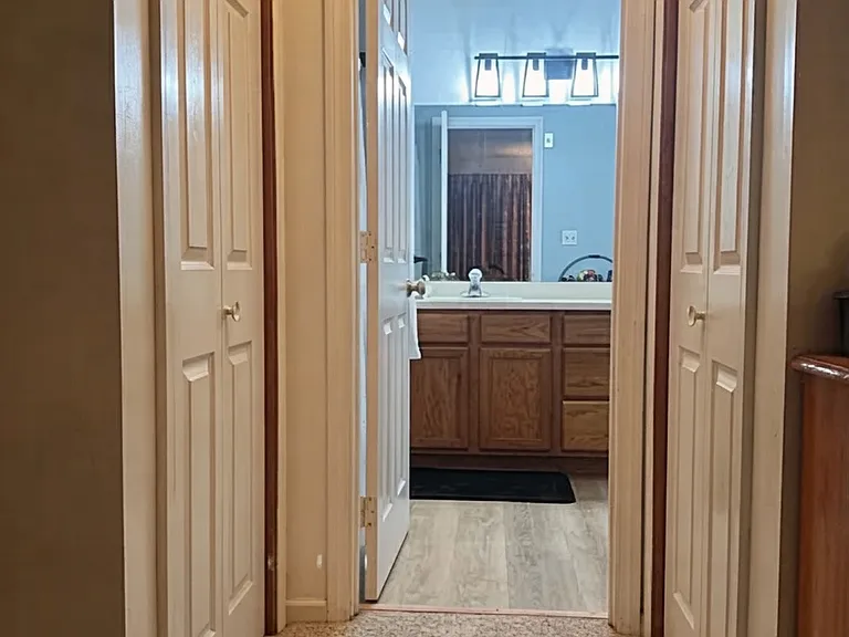 Master Suite (His and Hers closets on either side of the hallway)