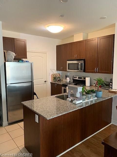 2nd image of 383 Main St E #421