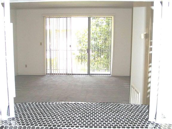 Bar in kitchen open towards Living room Dining room combination