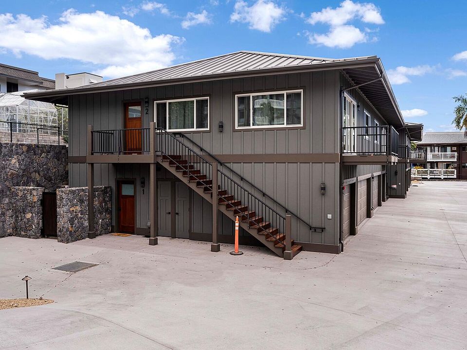 Building as coming down driveway. Unit 2 is top floor end unit in this photo.