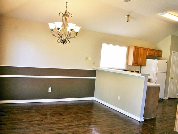Dining room with bar to kitchen