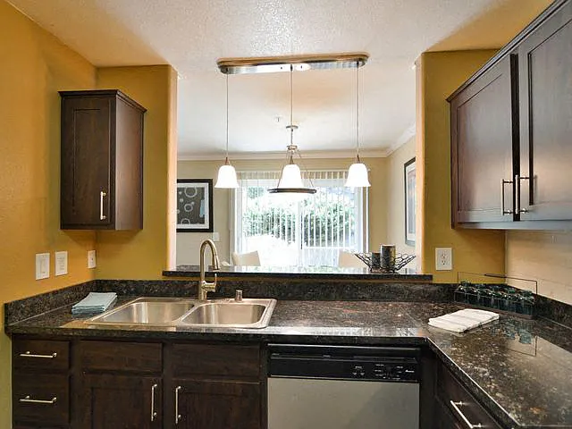 Chef inspired kitchen islands with chic pendant lighting at Crooked Oak at Loma Verde Preserve, Novato, 94949