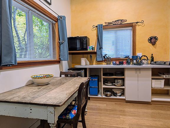 Well stocked Kitchenette + Eating / work table