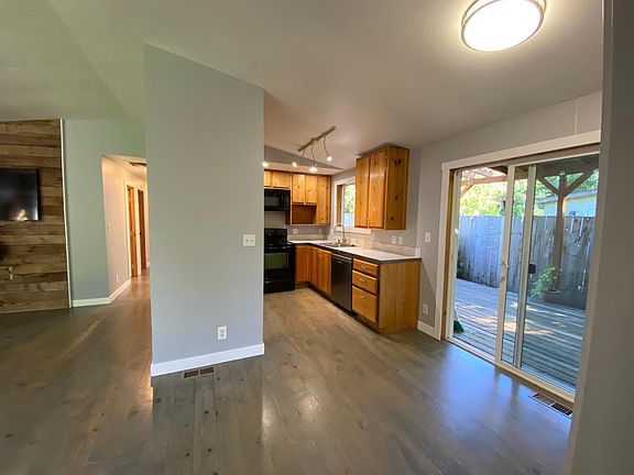Kitchen/dining room, slider to side deck.