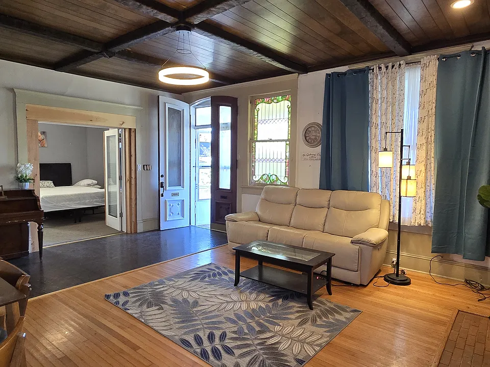 Living Room with High Ceiling