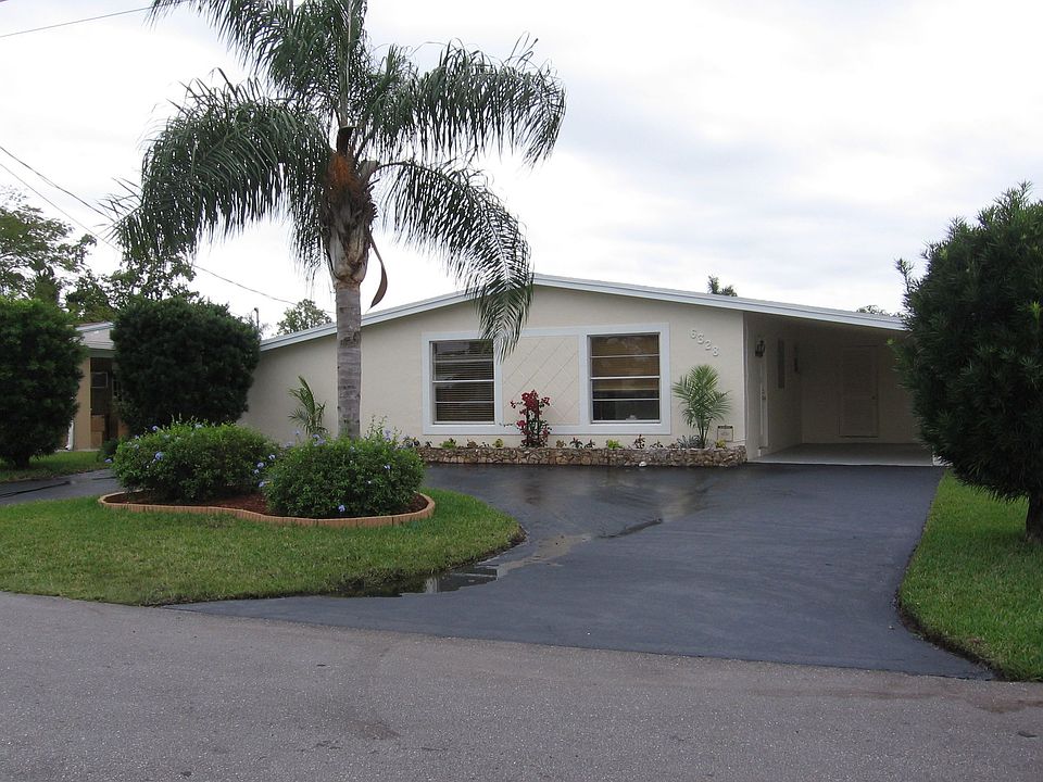 circle drive and carport