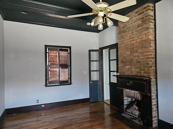 BEDROOM WITH FIREPLAXE & FRENCH DOORS