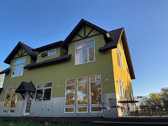 East and North sides of the home both with decks.