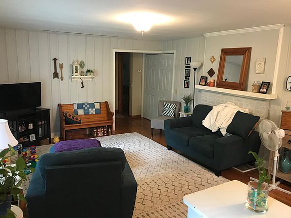 Living room; fireplace not operable.