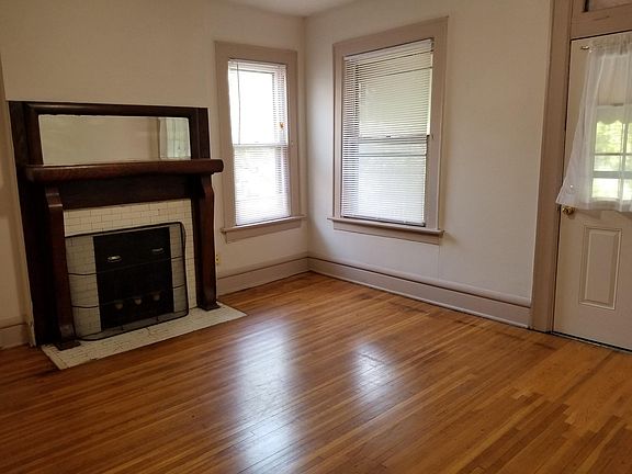 Living room with access to the front porch.