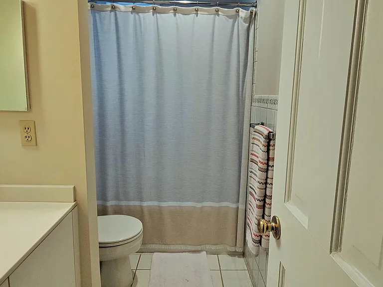 Second Bath is shared between two bedrooms on the main floor