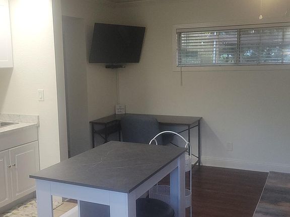 Corner desk, TV and chair