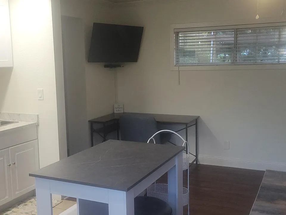 Corner desk, TV and chair