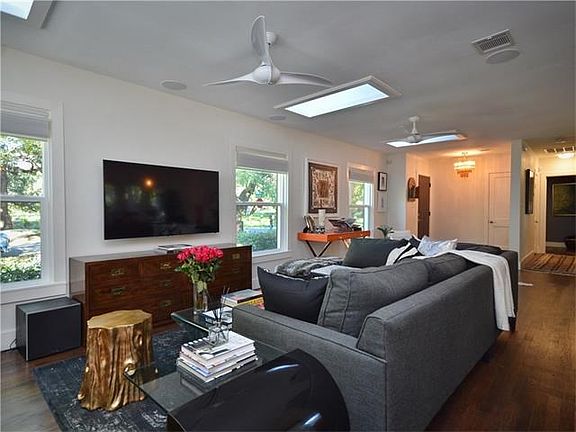 Level 5 wall finish, wood floors, surround sound, sky lights and more.