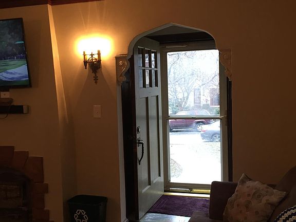Closet in tiled entryway