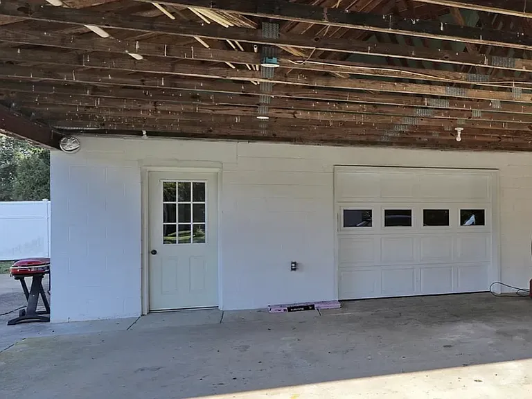 Covered parking and private entrance to unit.