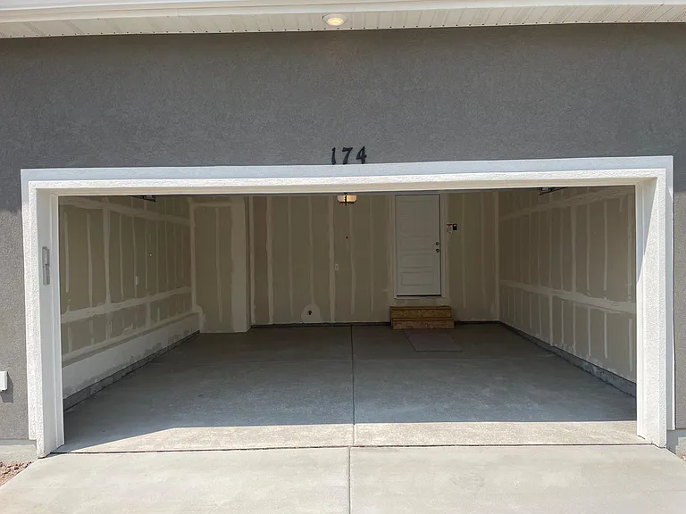 2-car garage w/ driveway.