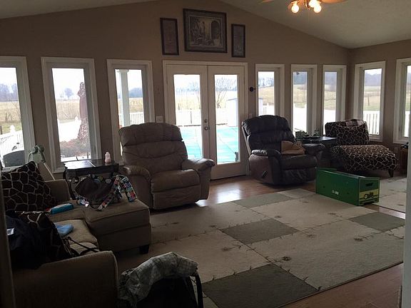 Sun room leading to pool