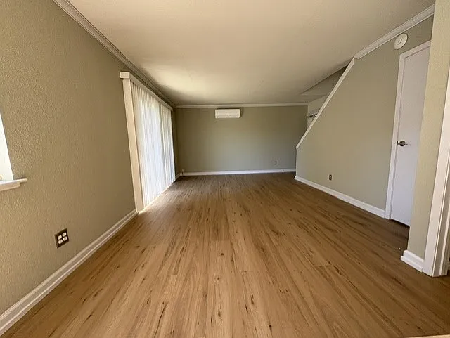 Living room. Split system heat/AC on far wall