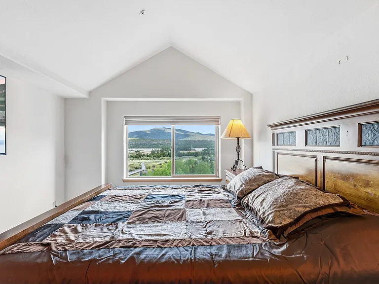 Primary bedroom with lake views