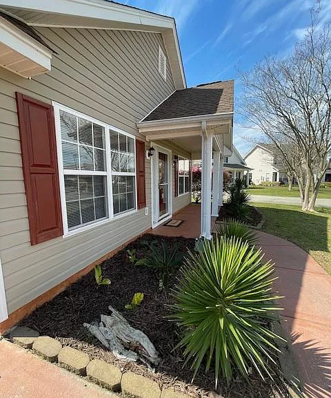 Walkway leading from driveway straight to the front door.