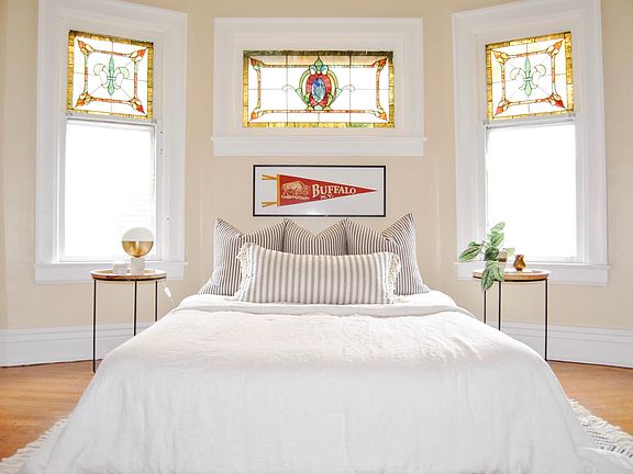 Master Bedroom with gorgeous stained glass windows