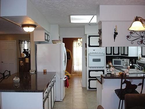 VIEW FROM KITCHEN TOWARD DINING ROOM
