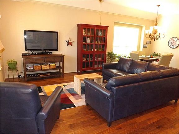 The family room is generous in space and can be used to fit your needs.