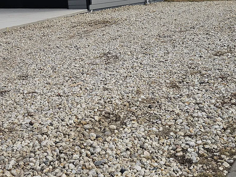 Extra Parking on Side of House with plug in for camper