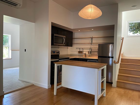 Kitchen/Dining Room. Tall ceilings and solid maple wood floors.