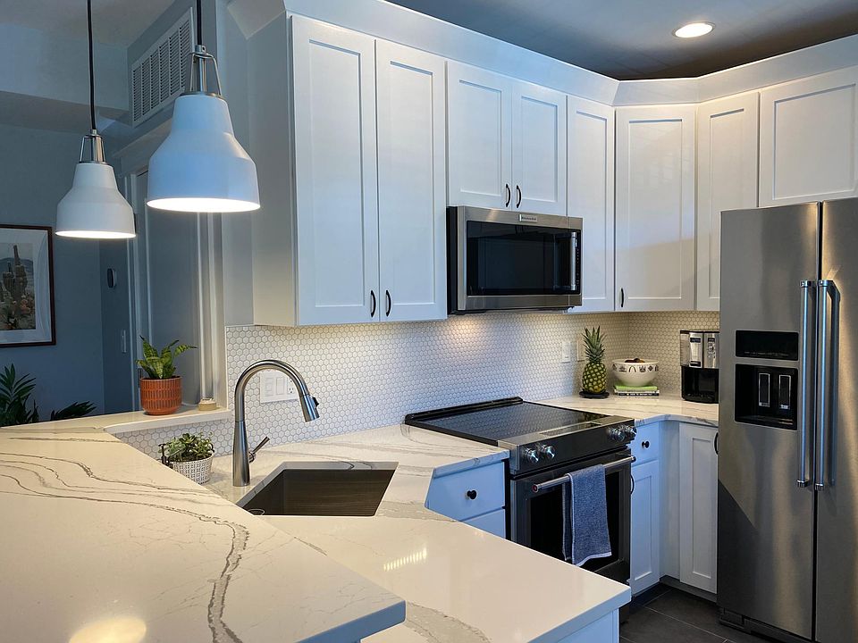 Renovated with high-end finishes, plenty of cabinet space.