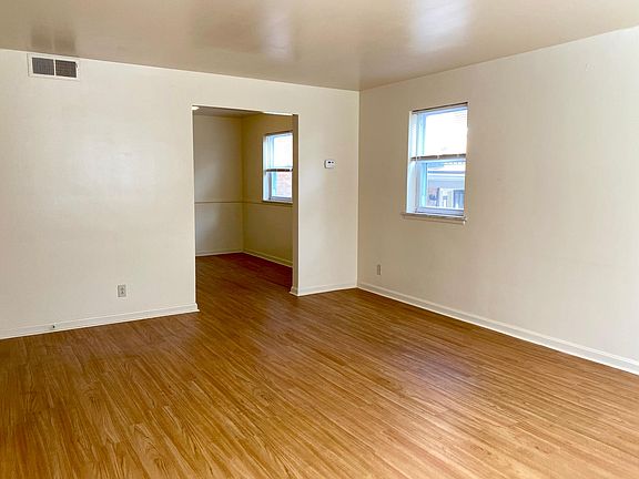 Living rooms flows right into the dining area.
