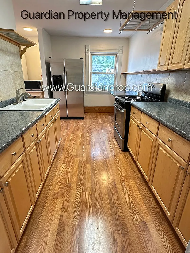 Linden Hills Upper Level Duplex, Sunroom, In Unit Laundry, Dishwasher, Garage Space Included — Photo 2