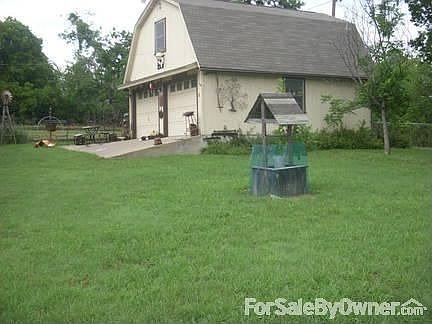 Living Room
						:
						Built-in lighted bookcase