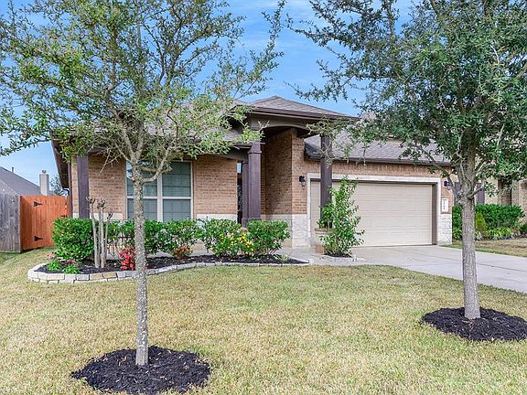 The well manicured lawn will welcome guest to your home.