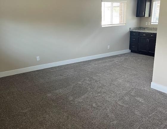 Living room and part of dining area