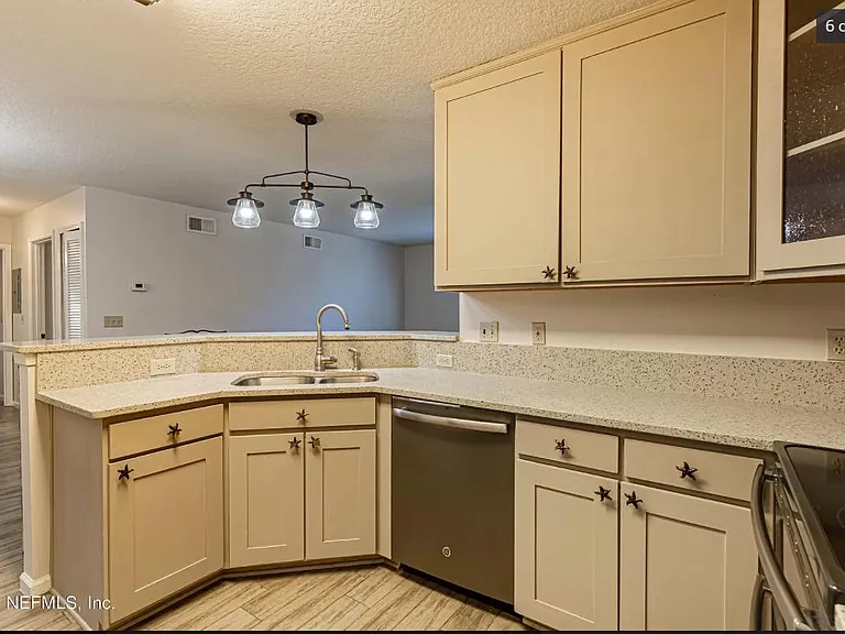 Quarters countertops with lots of cabinets for storage