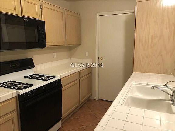 ENTER INTO KITCHEN FROM GARAGE