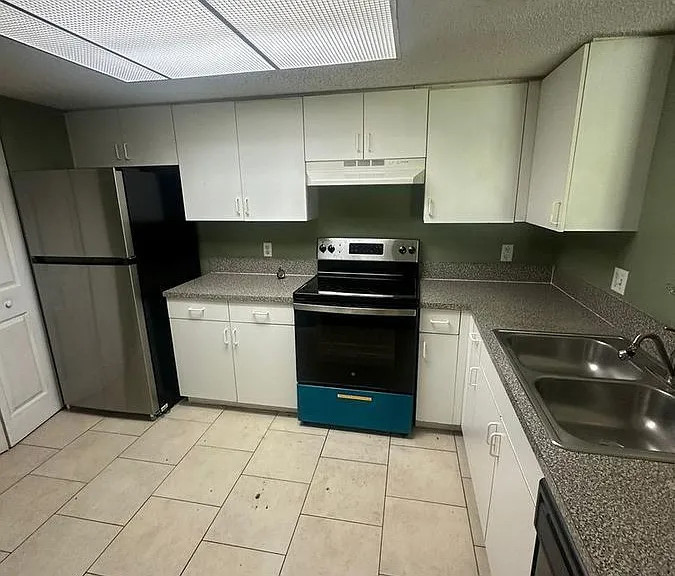 5005 Wiles Rd #102 — Photo 8