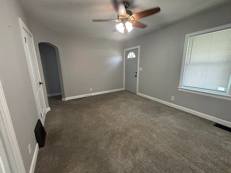 The view of the living room from the kitchen doorway