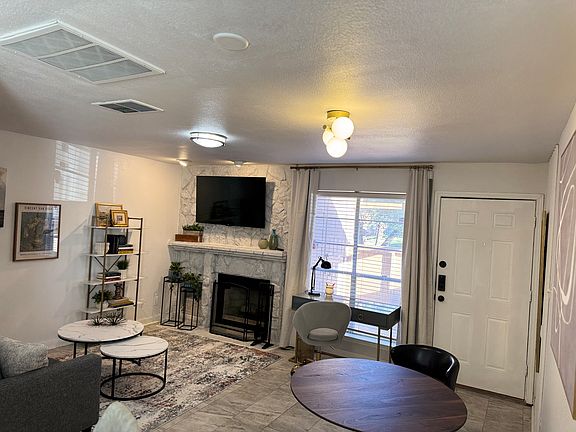 Condo is small but styled with easy modern lifestyle in mind. The 48" desk at the window provides a great work from home area. Fireplace creates a cozy atmosphere during colder months.
