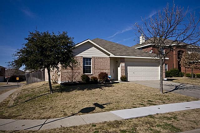 Home sits on large corner lot.