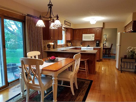 Inside you will find a formal and informal dining room as well as hardwood floors, cherry wood cabinets and more!