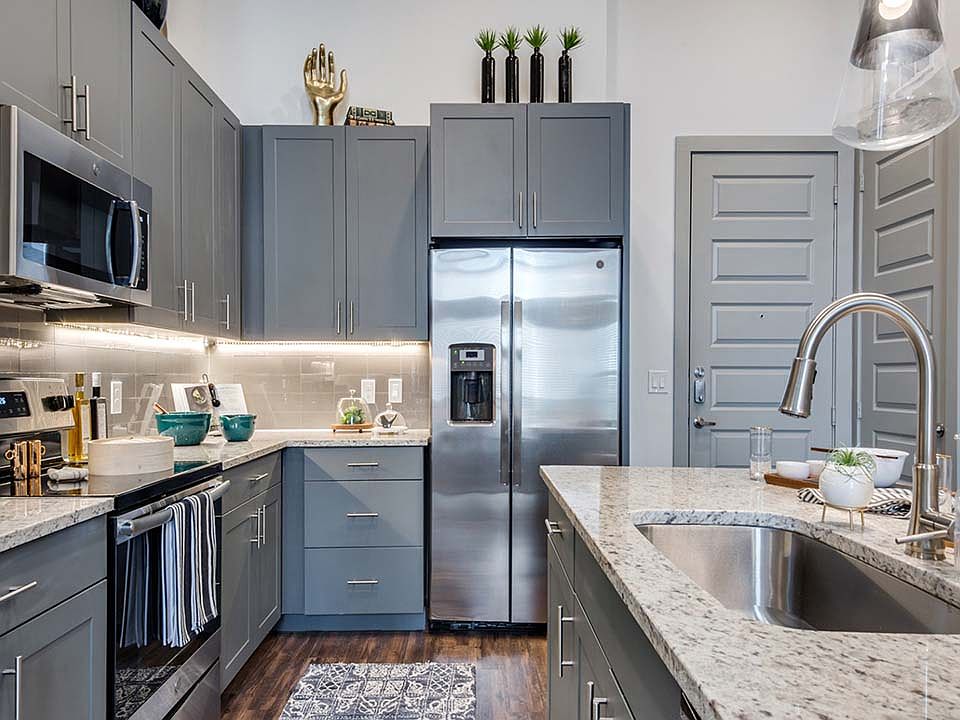Griffis Frisco apartment kitchen with stainless steel appliances.