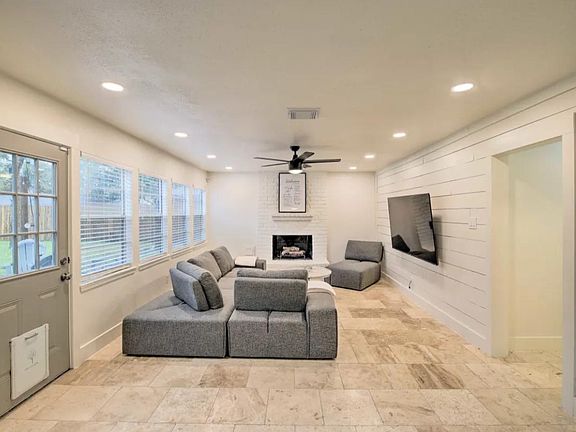 SPACIOUS OPEN LIVING ROOM WITH FIREPLACE