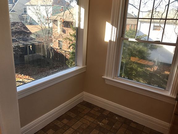 Kitchen with a Huge Glass window view of BackYard